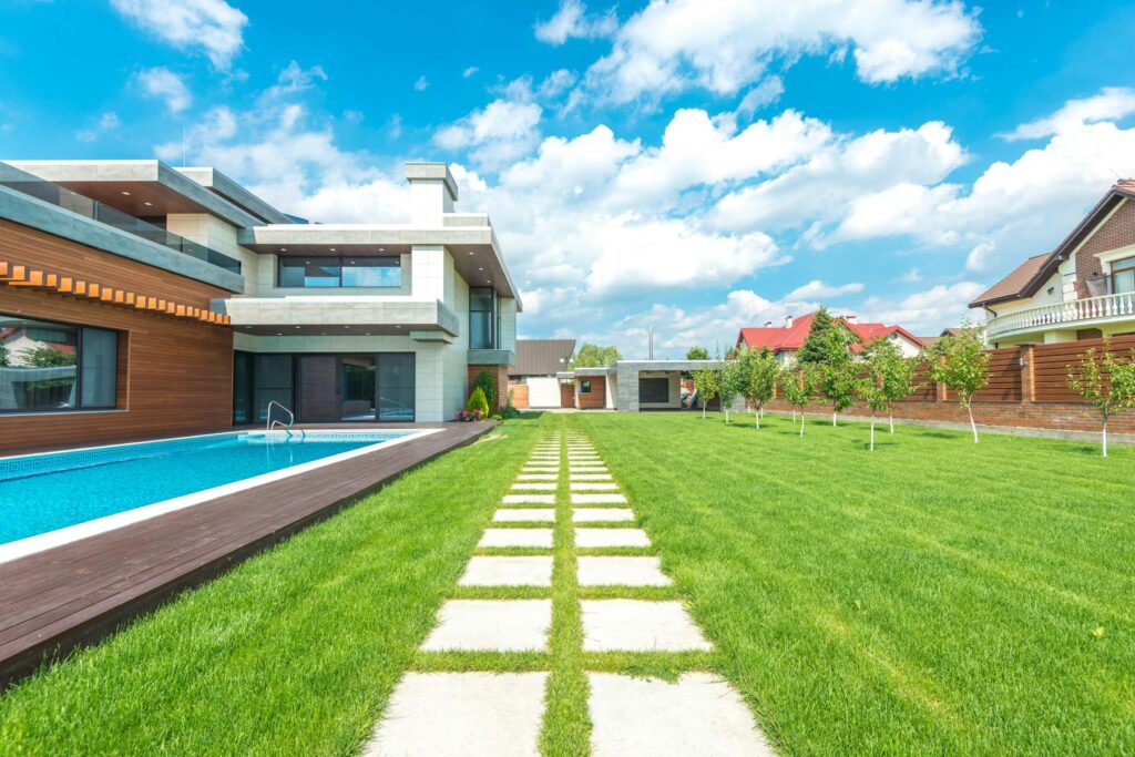 Modern luxury home with pool and large backyard